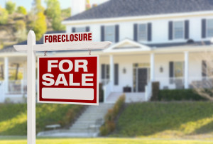 Foreclosure sign in front of home